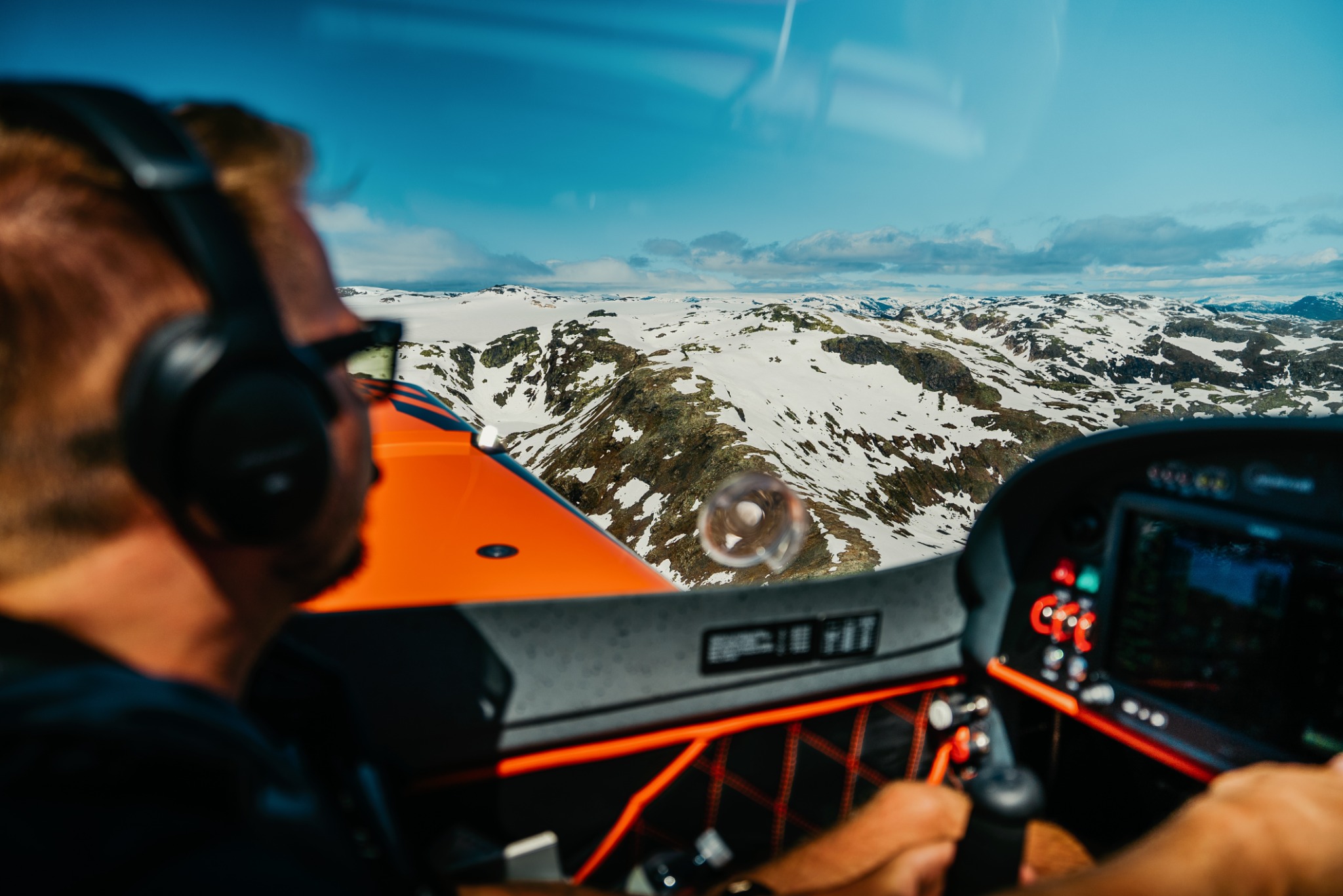 Cockpit over snowy Nordic mountains