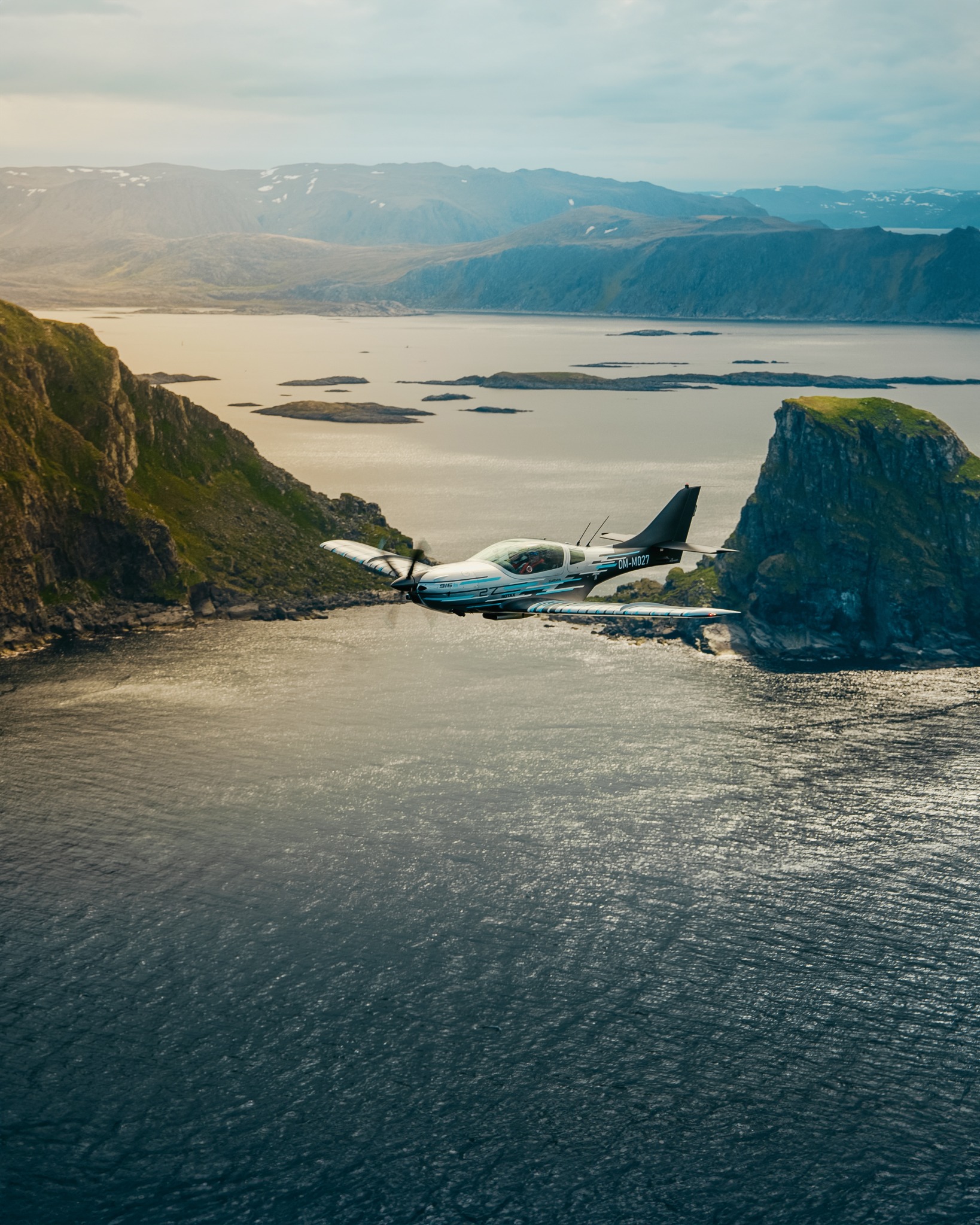 Aircraft flying over Norwegian fjords